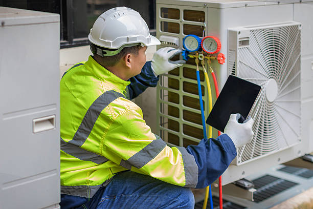 Professional Hvac technician working in Paola, KS